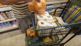 imagem de um carrinho de supermercado com produtos 