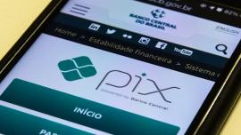 imagem celular com o nome e logo pix 